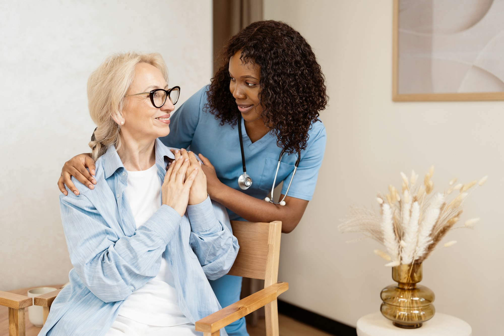 Nurse Providing Compassionate Care to Elderly Woman at Home