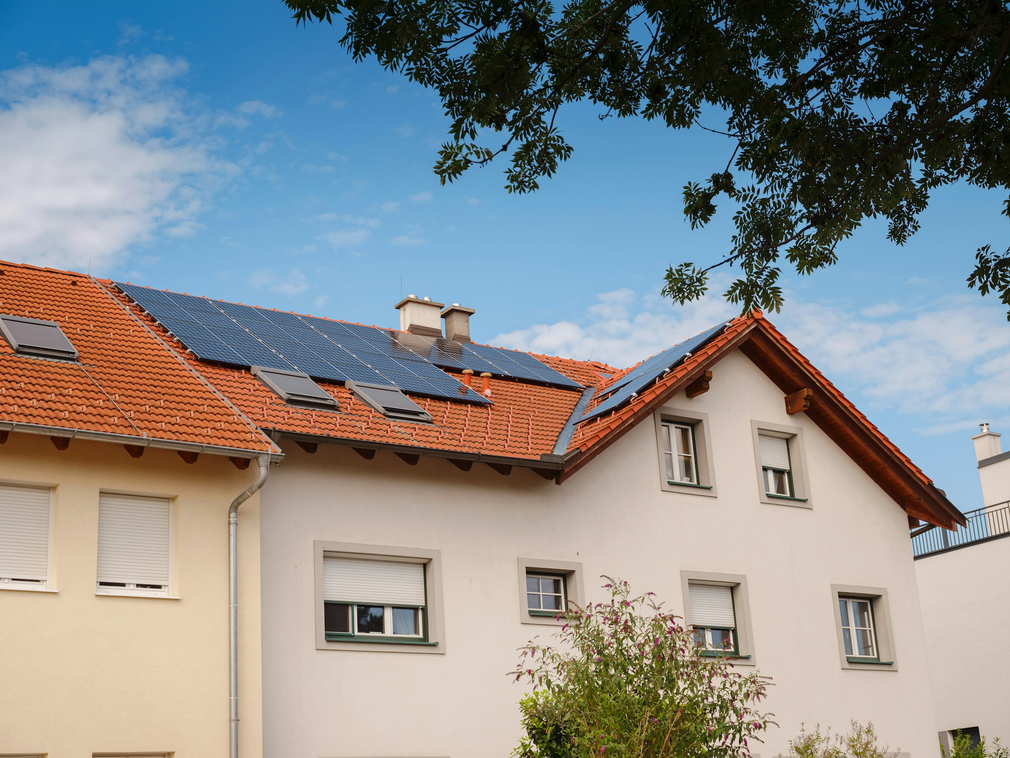 Solar photovoltaic panels on house roof